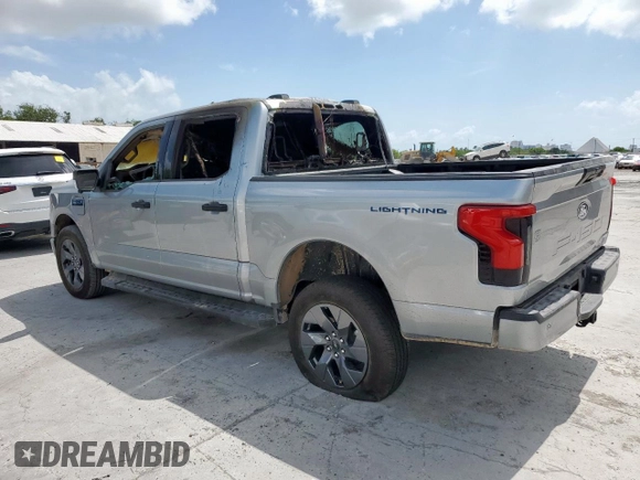 2024 Ford F-150 Lightning XLT with VIN 1FTVW3LK2RWG25755, listed as a Copart auction lot 59695355 with Not provided miles and Salvage title. Bid and sale history available at DreamBid. Image 2.