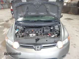 2008 Honda Civic Cpe EX with VIN 2HGFG12878H559388, listed as a IAAI auction lot 42184557 with 164,412 mi miles. Bid and sale history available at carsss.com. Image 9.