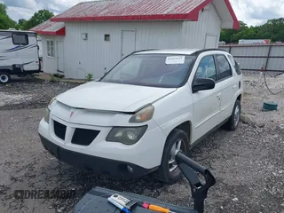2002 Pontiac Aztek z VIN 3G7DA03E52S579681, wystawiony jako IAAI lot #42165625 z przebiegiem Nie podano mil oraz . Historia ofert i sprzedaży dostępna na DreamBid. Obrazek 2.