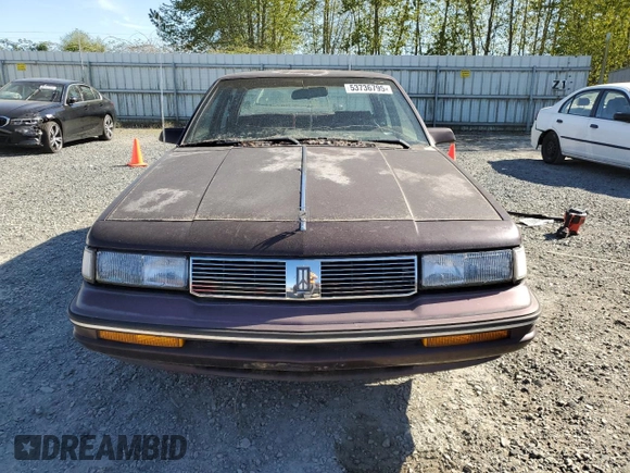 1987 Oldsmobile Cutlass Ciera with VIN 2G3AM51RXH9391582, listed as a Copart auction lot 53736795 with 81,728 mi miles and Clean Title. Bid and sale history available at DreamBid. Image 5.