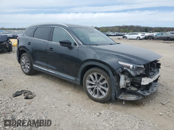 2021 Mazda CX-9 Carbon Edition z VIN JM3TCADY9M0514372, wystawiony jako Copart lot #52902555 z przebiegiem 99 812 mil mil oraz Szkoda całkowita • Salvage title. Historia ofert i sprzedaży dostępna na DreamBid. Obrazek 4.
