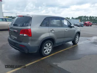 2013 Kia Sorento LX with VIN 5XYKT3A1XDG381218, listed as a IAAI auction lot 42511747 with 130,253 mi miles and . Bid and sale history available at DreamBid. Image 4.