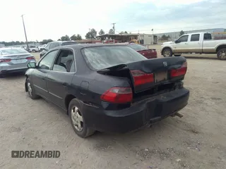 2000 Honda Accord EX z VIN 1HGCG5654YA033907, wystawiony jako IAAI lot #37283152 z przebiegiem 186 047 mil mil oraz . Historia ofert i sprzedaży dostępna na DreamBid. Obrazek 3.