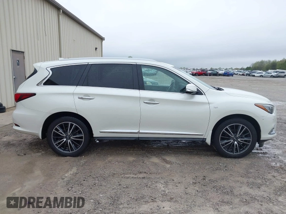 2016 Infiniti QX60 with VIN 5N1AL0MN9GC514600, listed as a IAAI auction lot 41931246 with 197,232 mi miles and . Bid and sale history available at DreamBid. Image 13.