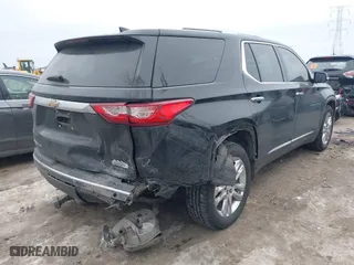 2018 Chevrolet Traverse High Country with VIN 1GNEVKKW0JJ101899, listed as a IAAI auction lot 41398396 with 107,055 mi miles. Bid and sale history available at carsss.com. Image 4.