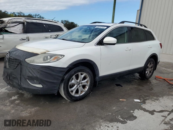 2015 Mazda CX-9 Touring with VIN JM3TB2CAXF0452576, listed as a Copart auction lot 88972245 with 148,152 mi miles and Salvage Title. Bid and sale history available at carsss.com. Image 1.