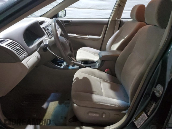 2004 Toyota Camry LE z VIN 4T1BE32K74U311882, wystawiony jako Copart lot #47997235 z przebiegiem 205 299 mil mil oraz Szkoda całkowita • Salvage title. Historia ofert i sprzedaży dostępna na DreamBid. Obrazek 7.