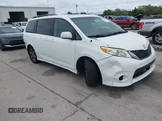 2011 Toyota Sienna SE with VIN 5TDXK3DC1BS069696, listed as a IAAI auction lot 41976857 with 160,994 mi miles. Bid and sale history available at carsss.com. Image 1.