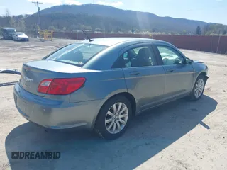 2010 Chrysler Sebring Limited with VIN 1C3CC5FB2AN207816, listed as a IAAI auction lot 41977487 with 130,052 mi miles and . Bid and sale history available at DreamBid. Image 4.