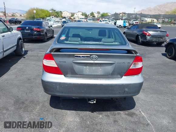 2003 Toyota Camry LE with VIN JTDBE32K130149032, listed as a IAAI auction lot 42063174 with 241,424 mi miles and . Bid and sale history available at DreamBid. Image 13.
