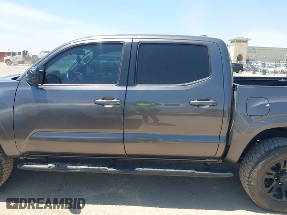 2021 Toyota Tacoma SR with VIN 3TYAX5GN3MT015565, listed as a IAAI auction lot 42241436 with 46,921 mi miles and . Bid and sale history available at DreamBid. Image 14.