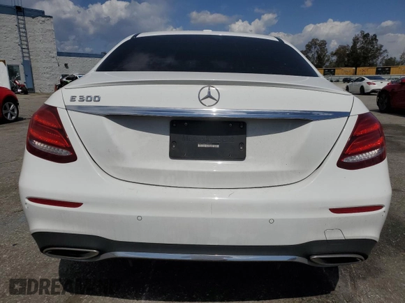 2019 Mercedes-Benz E 300 with VIN WDDZF4JB4KA568736, listed as a Copart auction lot 51931225 with 76,692 mi miles and Salvage title. Bid and sale history available at DreamBid. Image 6.