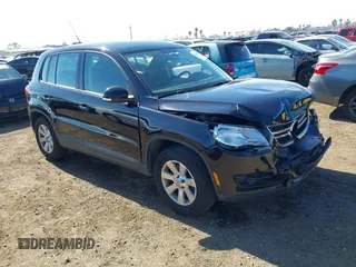 2010 Volkswagen Tiguan with VIN WVGAV9AX6AW000410, listed as a IAAI auction lot 41446852 with 118,728 mi miles and . Bid and sale history available at DreamBid. Image 1.