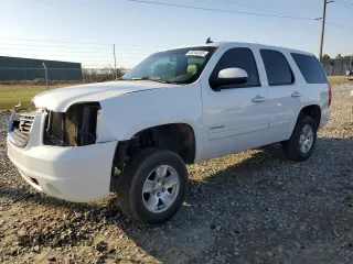 2013 GMC Yukon SLT with VIN 1GKS1CE0XDR178441, listed as a Copart auction lot 45245265 with 144,463 mi miles and Salvage Title. Bid and sale history available at carsss.com. Image 1.