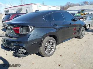 2019 BMW X6 xDrive35i with VIN 5UXKU2C50K0Z62820, listed as a IAAI auction lot 41006008 with 79,104 mi miles. Bid and sale history available at carsss.com. Image 4.