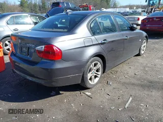 2008 BMW 3 Series 328xi with VIN WBAVC93518K043073, listed as a IAAI auction lot 42134507 with 148,712 mi miles. Bid and sale history available at carsss.com. Image 4.