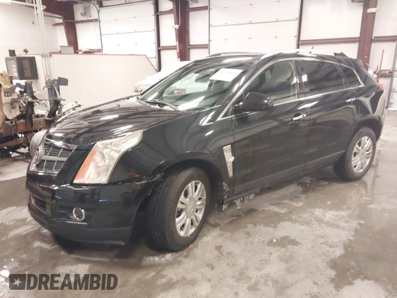2012 Cadillac SRX Luxury Collection with VIN 3GYFNAE31CS645977, listed as a IAAI auction lot 41276810 with 133,071 mi miles. Bid and sale history available at carsss.com. Image 2.