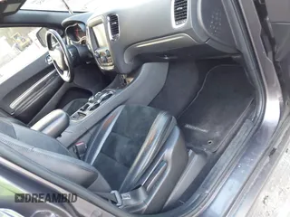 2015 Dodge Durango SXT with VIN 1C4RDJAG4FC784865, listed as a IAAI auction lot 40872452 with 145,877 mi miles and . Bid and sale history available at carsss.com. Image 5.