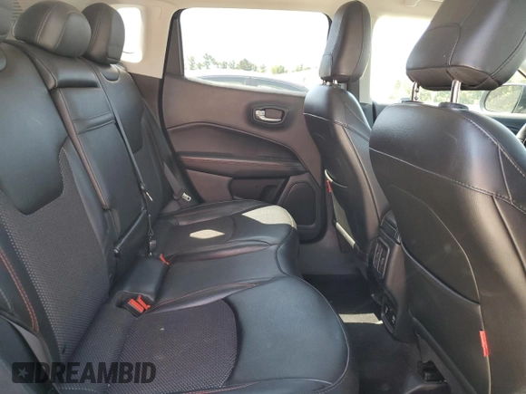 2019 Jeep Compass Trailhawk z VIN 3C4NJDDB1KT722170, wystawiony jako Copart lot #65063285 z przebiegiem 91 809 mil mil oraz Czysty tytuł • Clean title. Historia ofert i sprzedaży dostępna na DreamBid. Obrazek 11.