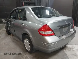 2009 Nissan Versa 1.8 S with VIN 3N1BC11EX9L396439, listed as a IAAI auction lot 42049665 with 49,617 mi miles. Bid and sale history available at carsss.com. Image 3.