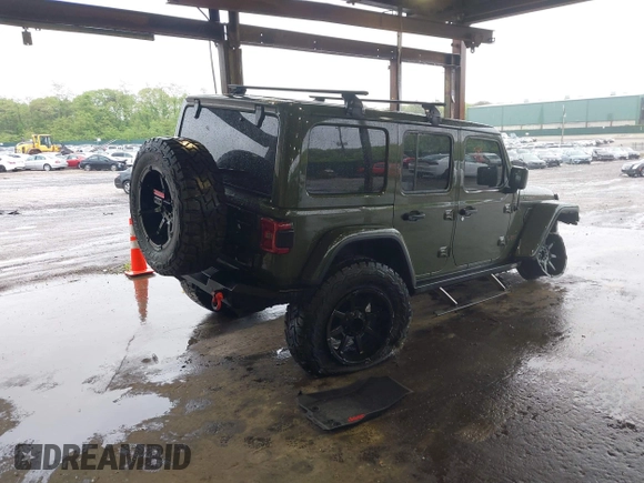 2021 Jeep Wrangler Unlimited Rubicon with VIN 1C4HJXFG4MW543254, listed as a IAAI auction lot 42316180 with 50,696 mi miles and . Bid and sale history available at DreamBid. Image 4.