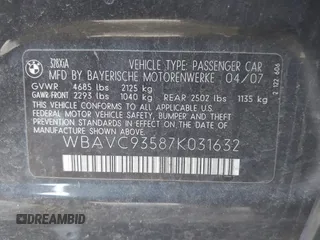 2007 BMW 3 Series 328xi with VIN WBAVC93587K031632, listed as a IAAI auction lot 41711350 with 184,703 mi miles. Bid and sale history available at carsss.com. Image 9.