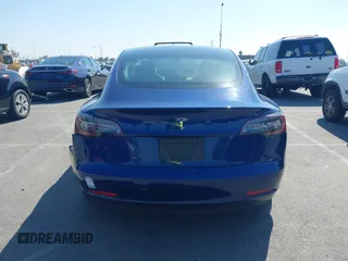 2023 Tesla Model 3 with VIN 5YJ3E1EA1PF431190, listed as a IAAI auction lot 41980007 with 26,164 mi miles and . Bid and sale history available at DreamBid. Image 16.