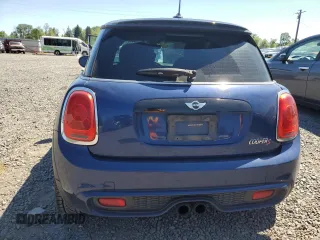 2014 MINI Hardtop S with VIN WMWXM7C51ET926090, listed as a Copart auction lot 55958745 with 148,997 mi miles and Salvage title. Bid and sale history available at DreamBid. Image 6.