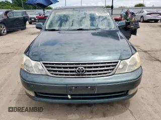 2003 Toyota Avalon XL z VIN 4T1BF28BX3U310285, wystawiony jako Copart lot #57664375 z przebiegiem 179 727 mil mil oraz Szkoda całkowita • Salvage title. Historia ofert i sprzedaży dostępna na DreamBid. Obrazek 5.