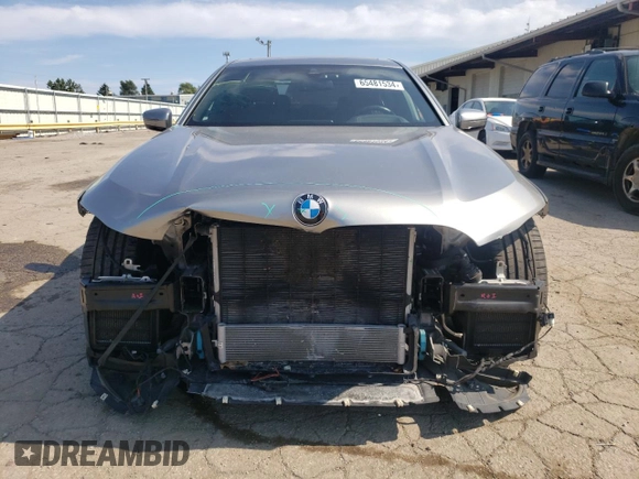 2020 BMW 7 Series 740i xDrive z VIN WBA7T4C03LGF97150, wystawiony jako Copart lot #65481534 z przebiegiem 49 705 mil mil oraz Szkoda całkowita • Salvage title. Historia ofert i sprzedaży dostępna na DreamBid. Obrazek 5.