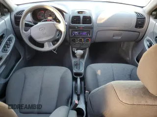 2003 Hyundai Accent GL with VIN KMHCG45C93U496038, listed as a Copart auction lot 87260904 with 104,251 mi miles and Salvage Title. Bid and sale history available at carsss.com. Image 8.