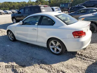2013 BMW 1 Series 128i with VIN WBAUP7C54DVP24583, listed as a Copart auction lot 77454984 with 114,358 mi miles and Salvage Title. Bid and sale history available at carsss.com. Image 2.