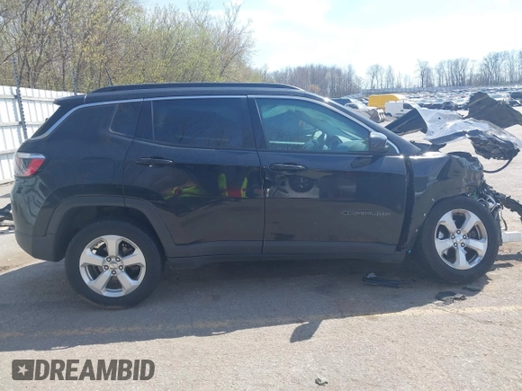 2018 Jeep Compass Latitude with VIN 3C4NJDBB1JT265894, listed as a IAAI auction lot 42109967 with 92,944 mi miles and . Bid and sale history available at DreamBid. Image 14.