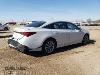 2022 Toyota Avalon Hybrid XLE z VIN 4T1AA1AB3NU013764, wystawiony jako Copart lot #52935075 z przebiegiem 60 590 mil mil oraz Szkoda całkowita • Salvage title. Historia ofert i sprzedaży dostępna na DreamBid. Obrazek 3.