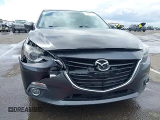2014 Mazda 3 S Touring with VIN JM1BM1V31E1132448, listed as a IAAI auction lot 41815085 with 144,705 mi miles and . Bid and sale history available at DreamBid. Image 6.