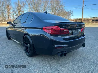 2018 BMW 5 Series M550i xDrive with VIN WBAJB9C55JB035226, listed as a Copart auction lot 60850325 with 156,183 mi miles and Clean title. Bid and sale history available at DreamBid. Image 3.