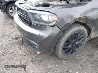 2016 Dodge Durango R/T with VIN 1C4SDJCT5GC440801, listed as a IAAI auction lot 42167132 with 151,016 mi miles and . Bid and sale history available at DreamBid. Image 6.