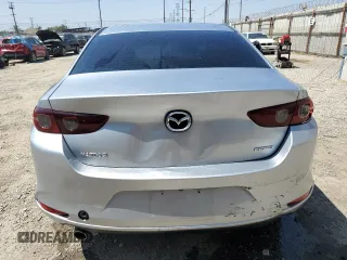 2019 Mazda 3 with VIN 3MZBPABL8KM112754, listed as a Copart auction lot 60616045 with 77,292 mi miles and Clean title. Bid and sale history available at DreamBid. Image 6.