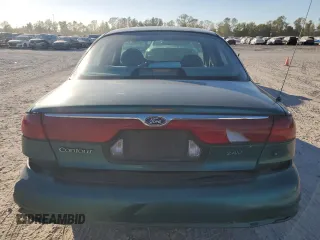 1998 Ford Contour z VIN 1FAFP65L2WK235594, wystawiony jako Copart lot #81118614 z przebiegiem 62 140 mil mil oraz Szkody całkowita. Historia ofert i sprzedaży dostępna na DreamBid. Obrazek 6.