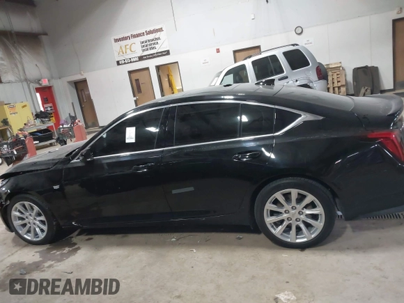 2021 Cadillac CT5 Luxury z VIN 1G6DX5RK0M0147667, wystawiony jako IAAI lot #41398726 z przebiegiem 50 387 mil mil oraz . Historia ofert i sprzedaży dostępna na DreamBid. Obrazek 14.