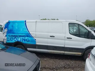 2020 Ford Transit Cargo with VIN 1FTBR1Y88LKB48985, listed as a IAAI auction lot 42009136 with 127,124 mi miles and . Bid and sale history available at DreamBid. Image 14.