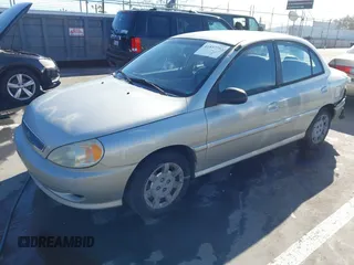 2002 Kia Rio with VIN KNADC123X26183989, listed as a IAAI auction lot 41837792 with 116,746 mi miles. Bid and sale history available at carsss.com. Image 2.