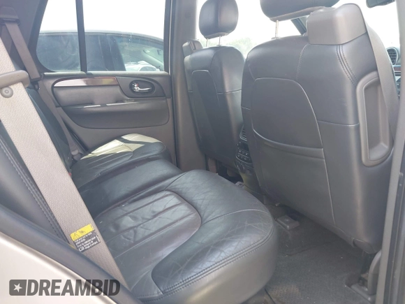 2004 GMC Envoy SLT with VIN 1GKDS13S742230325, listed as a IAAI auction lot 42385113 with 177,989 mi miles and . Bid and sale history available at DreamBid. Image 8.