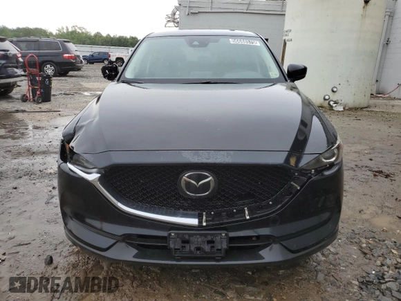 2018 Mazda CX-5 Touring z VIN JM3KFBCM4J0377280, wystawiony jako Copart lot #56688575 z przebiegiem 101 167 mil mil oraz Czysty tytuł • Clean title. Historia ofert i sprzedaży dostępna na DreamBid. Obrazek 5.