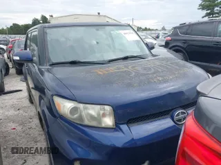 2014 Scion xB with VIN JTLZE4FE0EJ057503, listed as a IAAI auction lot 41994777 with 197,184 mi miles. Bid and sale history available at carsss.com. Image 1.
