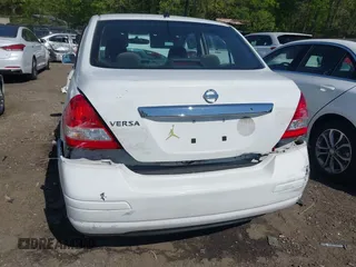 2010 Nissan Versa S with VIN 3N1BC1APXAL468424, listed as a IAAI auction lot 42015166 with 233,447 mi miles and . Bid and sale history available at DreamBid. Image 6.