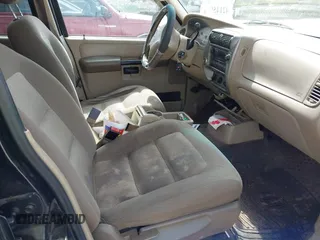 2005 Ford Explorer Sport Trac XLS with VIN 1FMZU67K15UA48446, listed as a IAAI auction lot 42145064 with 220,650 mi miles and . Bid and sale history available at DreamBid. Image 5.