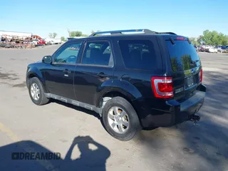 2011 Ford Escape Limited with VIN 1FMCU9EGXBKB66282, listed as a IAAI auction lot 42177063 with 244,515 mi miles. Bid and sale history available at carsss.com. Image 3.
