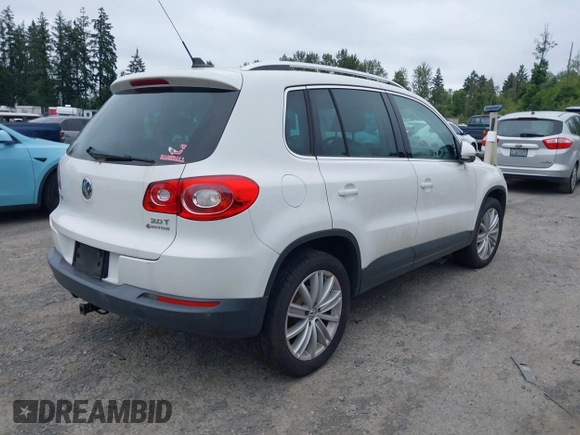 2010 Volkswagen Tiguan with VIN WVGBV9AX2AW513478, listed as a IAAI auction lot 42607466 with 63,780 mi miles and . Bid and sale history available at DreamBid. Image 4.