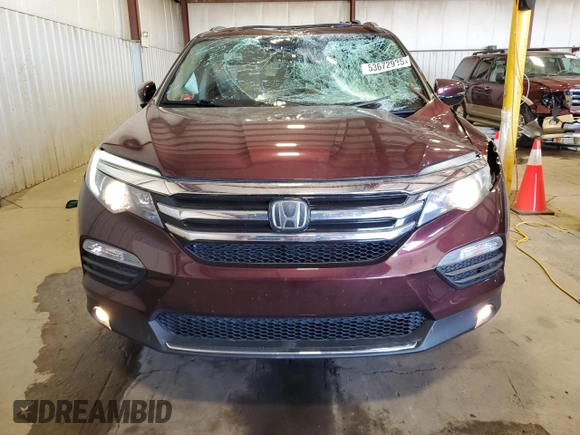 2017 Honda Pilot Touring with VIN 5FNYF6H97HB077601, listed as a Copart auction lot 53672935 with 73,484 mi miles and Salvage Title. Bid and sale history available at carsss.com. Image 5.